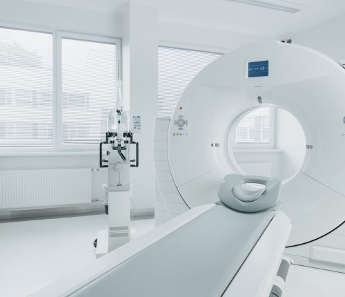 Medical CT or MRI or PET Scan Standing in the Modern Hospital Laboratory. Technologically Advanced and Functional Mediсal Equipment in a Clean White Room.